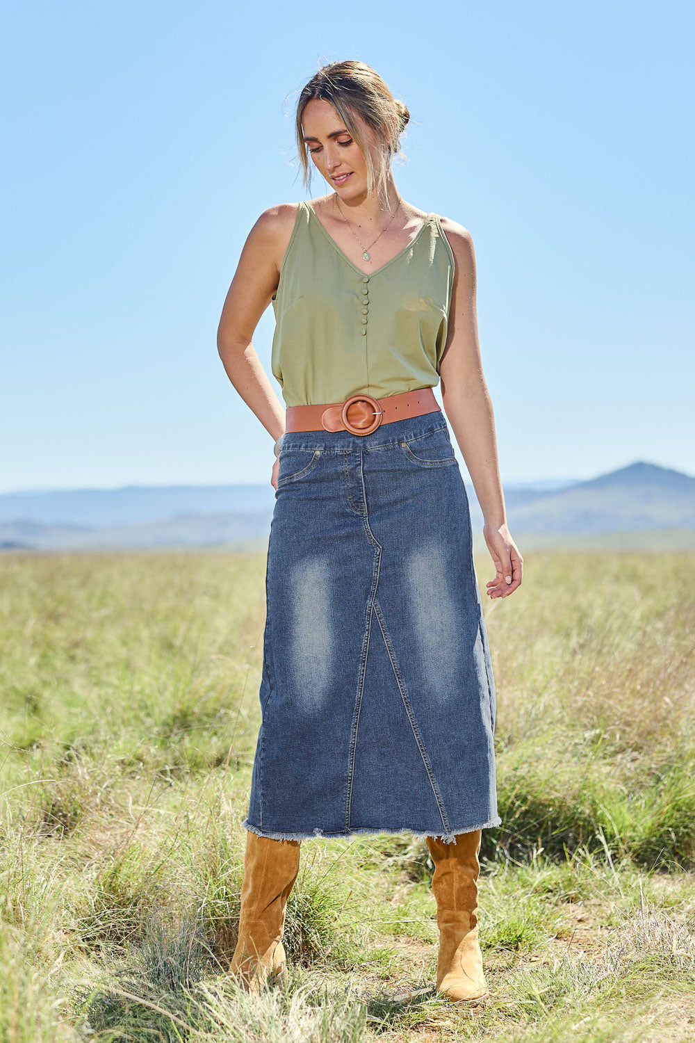 Model Tegan wearing size 10 of the Sweetie Pie Cotton Top in colour Khaki (Green), from the front, showing the whole outfit