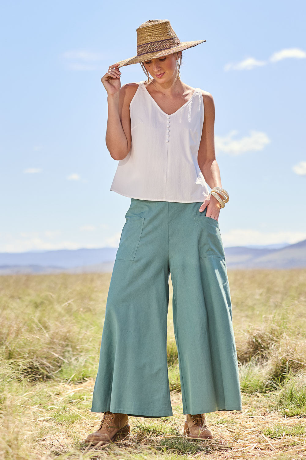 Model Tegan wearing size 10 of the Sweetie Pie Cotton Top in colour Milk (White), from the front, showing the whole outfit
