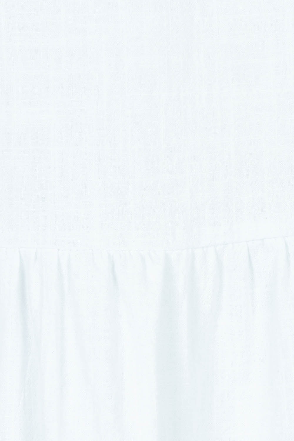 Product shot of the Fun Times Cotton Flounce Top in colour White (White), detail