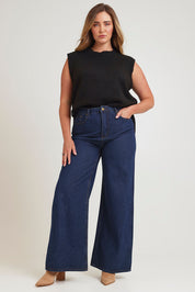 Model Chanel wearing size XL of the Found My Friend Recycled Knit Vest in colour Black (Black), from the front, showing the whole outfit
