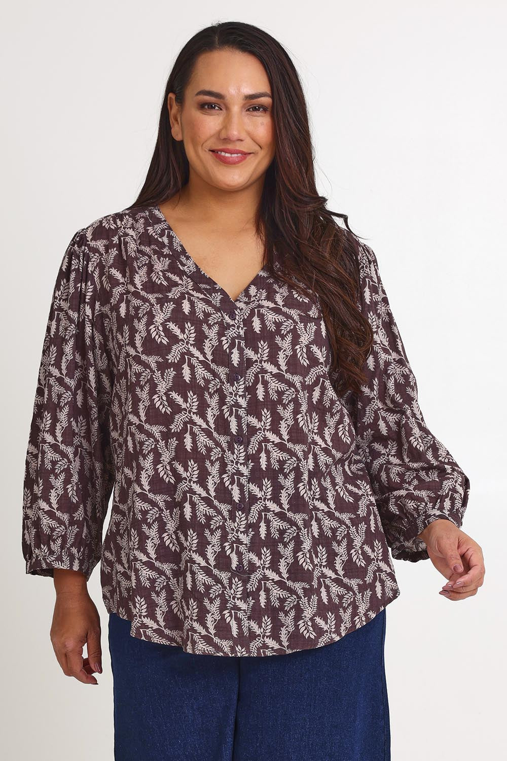 Model Ashleigh wearing size 16 of the Easy On Me Blouse in colour Charcoal (Grey), from the front, cropped image