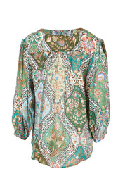 Product shot of the Easy On Me Blouse – Greenfolk in colour Greenfolk, from the back