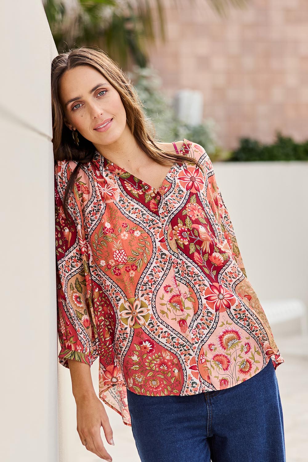 Model Tegand wearing size 10 of the Easy On Me Blouse – Rustfolk in colour Rustfolk, in a cropped view