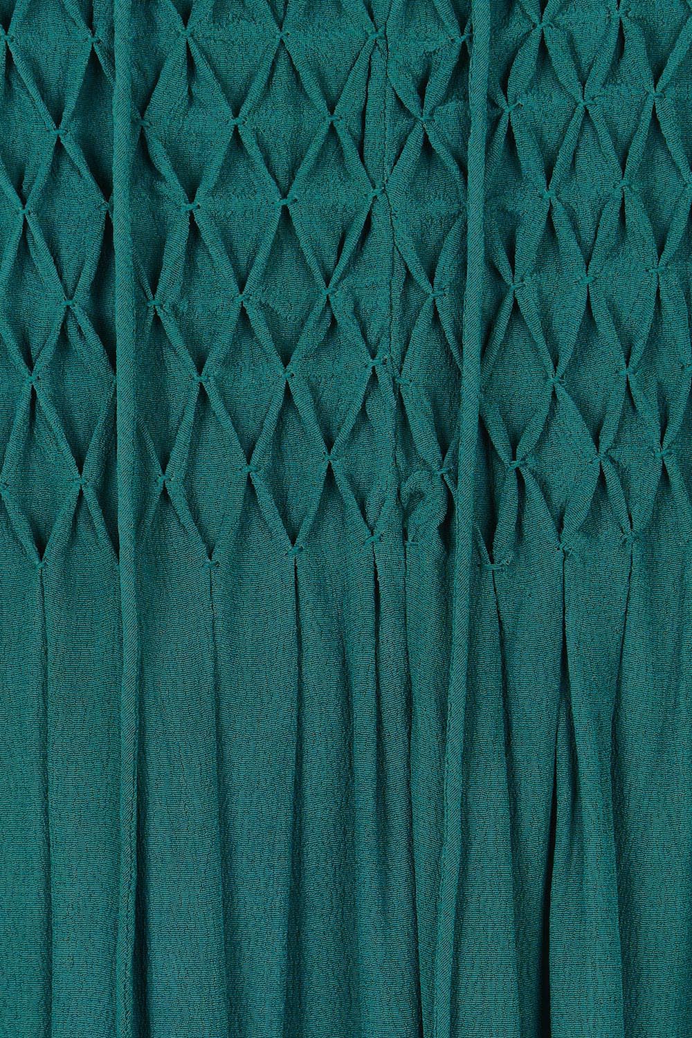 Product shot of the Meadow Meander Smocked Dress in colour Jade (Green), detail