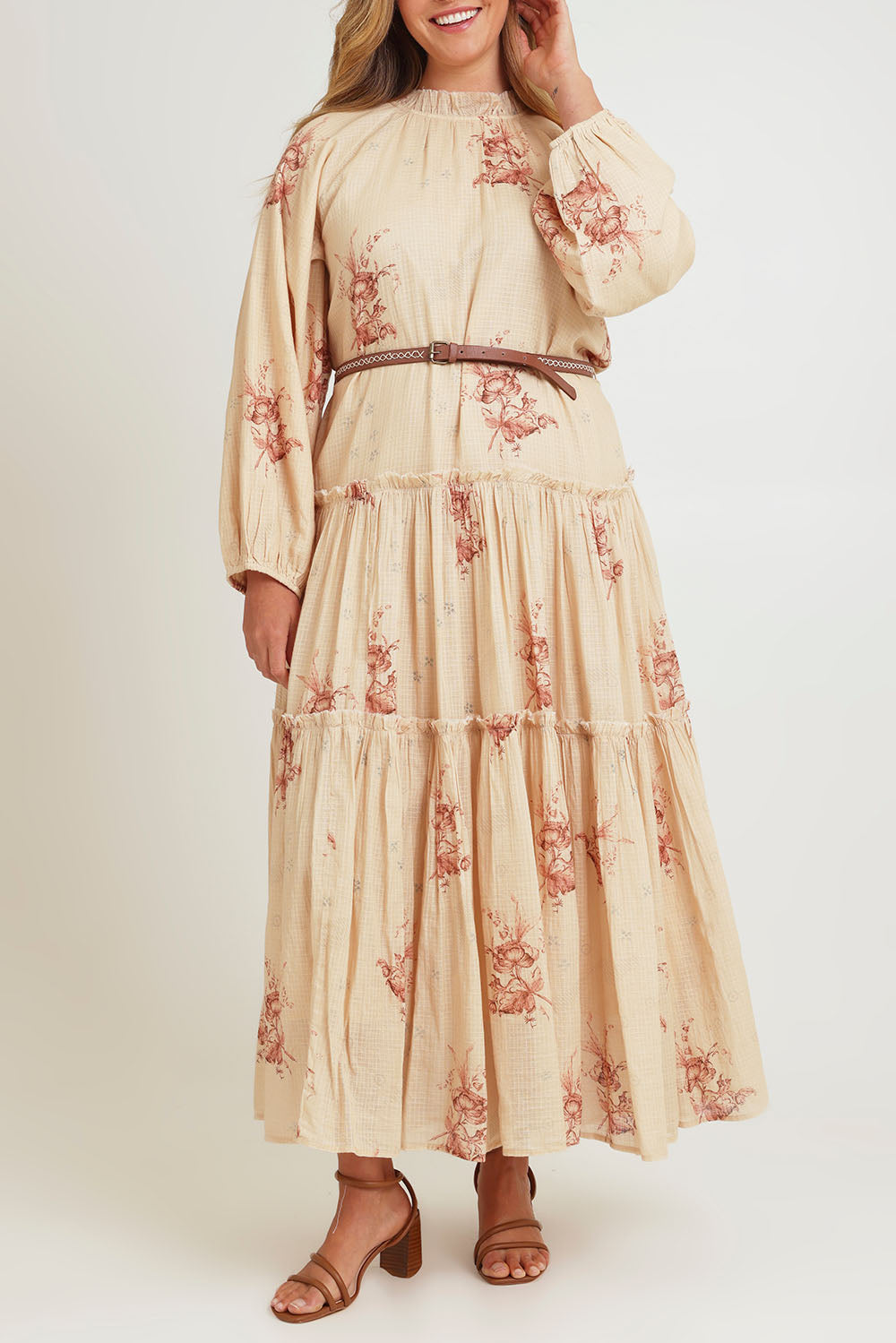 Model Chanel wearing size 16 of the Falling Into Your Arms Cotton Maxi Dress in colour Sandfleur, from the front, cropped image