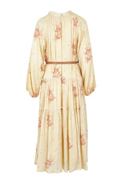 Product shot of the Falling Into Your Arms Cotton Maxi Dress in colour Sandfleur, from the back