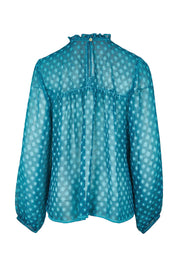 Product shot of the Drifting Along Blouse in colour Jade (Blue), from the back