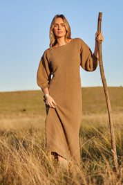Model Tegan wearing size S of the Come As You Are Cotton Knit Dress in colour Camel, from the front, showing the whole outfit