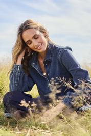 Model Tegan wearing size 10 of the Denim Daze Billow Sleeve Shirt in colour Denim (Blue), from the front, showing the whole outfit