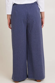 Model Chanel wearing size 16 of the Walk This Way Wide Leg Pants in colour Bluestripe (Blue), from the back