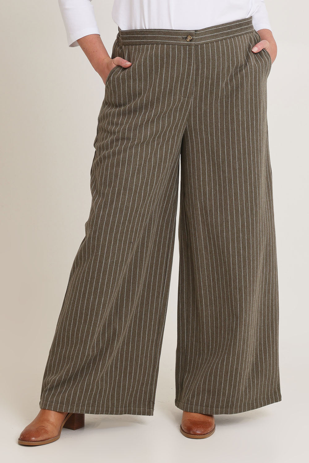 Model Chanel wearing size 16 of the Walk This Way Wide Leg Pants in colour Chocstripe, from the front, cropped image