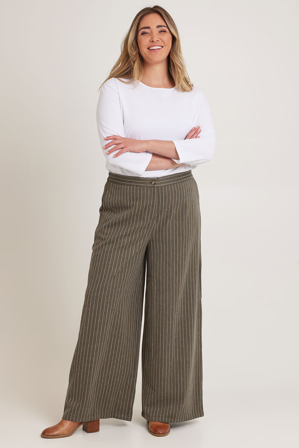 Model Chanel wearing size 16 of the Walk This Way Wide Leg Pants in colour Chocstripe, from the front, showing the whole outfit