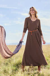 Model Tegan wearing size 10 of the Bamboo Delight Maxi Dress in colour Chocolate, from the front, showing the whole outfit