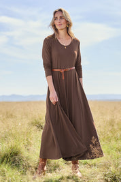 Model Tegan wearing size 10 of the Bamboo Delight Maxi Dress in colour Chocolate, from the front, showing the whole outfit