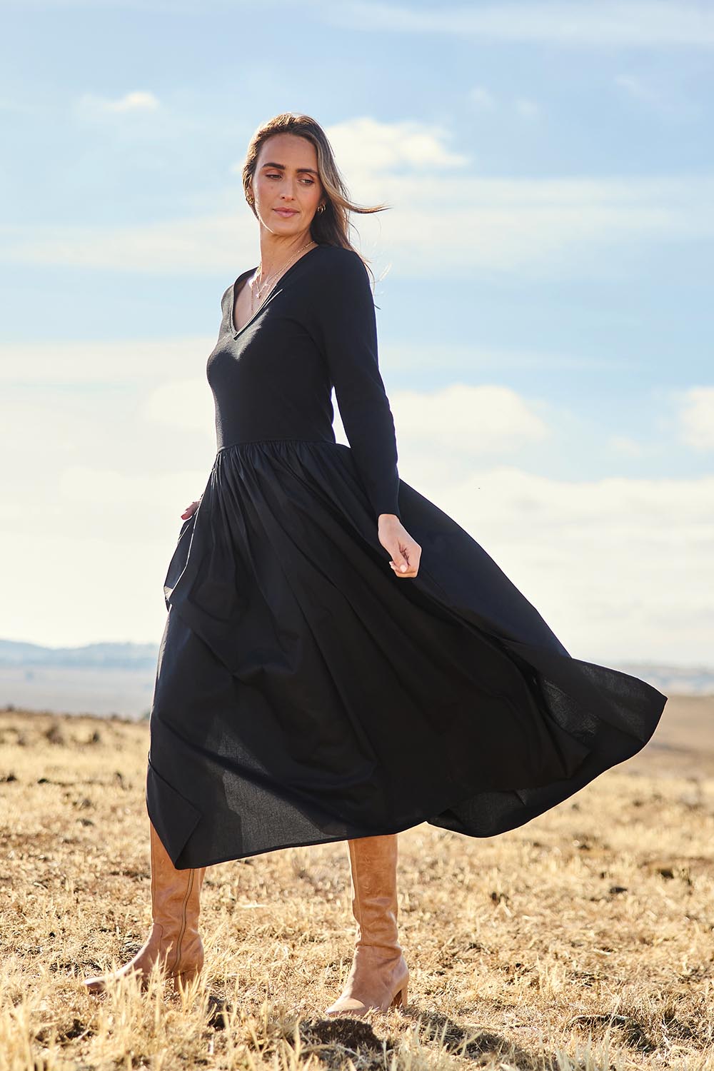 Model Tegan wearing size 10 of the Sweet Intentions Long Sleeve V Neck Maxi Dress in colour Black (Black), from the front, showing the whole outfit
