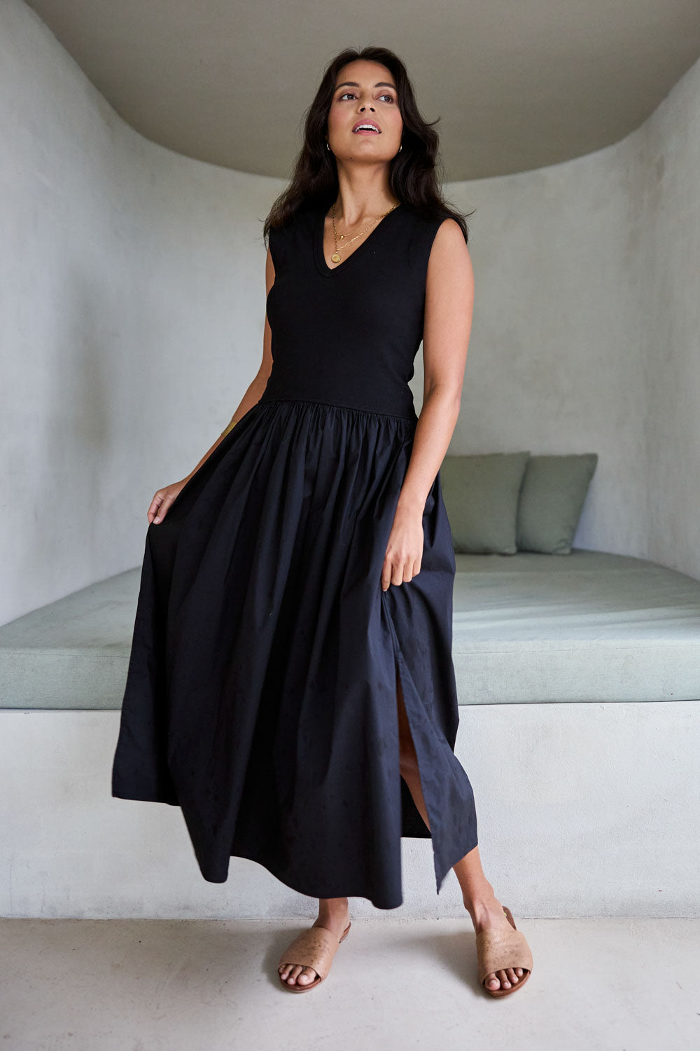 Model Tahnee wearing size 10 of the Sweet Intentions V Neck Maxi Dress in colour Black (Black), from the front, showing the whole outfit