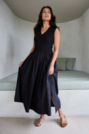 Model Tahnee wearing size 10 of the Sweet Intentions V Neck Maxi Dress in colour Black (Black), from the front, showing the whole outfit