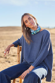Model Tegan wearing size S of the Easy Does It Knit Top in colour Denim (Blue), from the front, showing the whole outfit