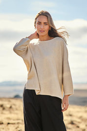 Model Tegan wearing size S of the Easy Does It Knit Top in colour Natural, from the front, showing the whole outfit