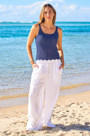 Model Tegan wearing size S of the You Are My Sunshine Cotton Blend Knit Tank in colour Navy (Blue), from the front, showing the whole outfit