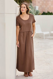 Model Tegand wearing size 10 of the Casual Saturday Dress - Chocolate in colour Chocolate, from the front