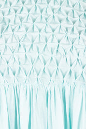 Product shot of the Summer Breeze Smocked Cotton Dress in colour Sky (Blue), detail
