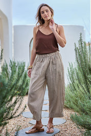 Model Tegand wearing size 10 of the Beach Wandering Cotton Pants – Chocstripe in colour Chocstripe, from the front