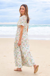Model Tegan wearing size 10 of the Sweet Feels Cotton Maxi Dress in colour Garden, from the front, showing the whole outfit