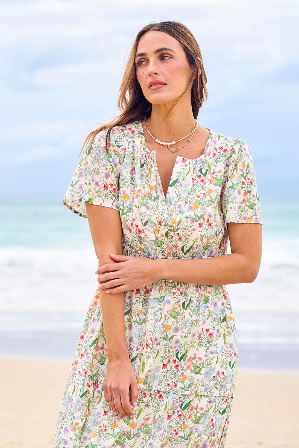 Model Tegan wearing size 10 of the Sweet Feels Cotton Maxi Dress in colour Garden, from the front, showing the whole outfit