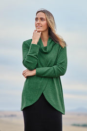 Model Tegan wearing size 10 of the Crossing The Plains Snuggle Jumper in colour Forest (Green), from the front, showing the whole outfit
