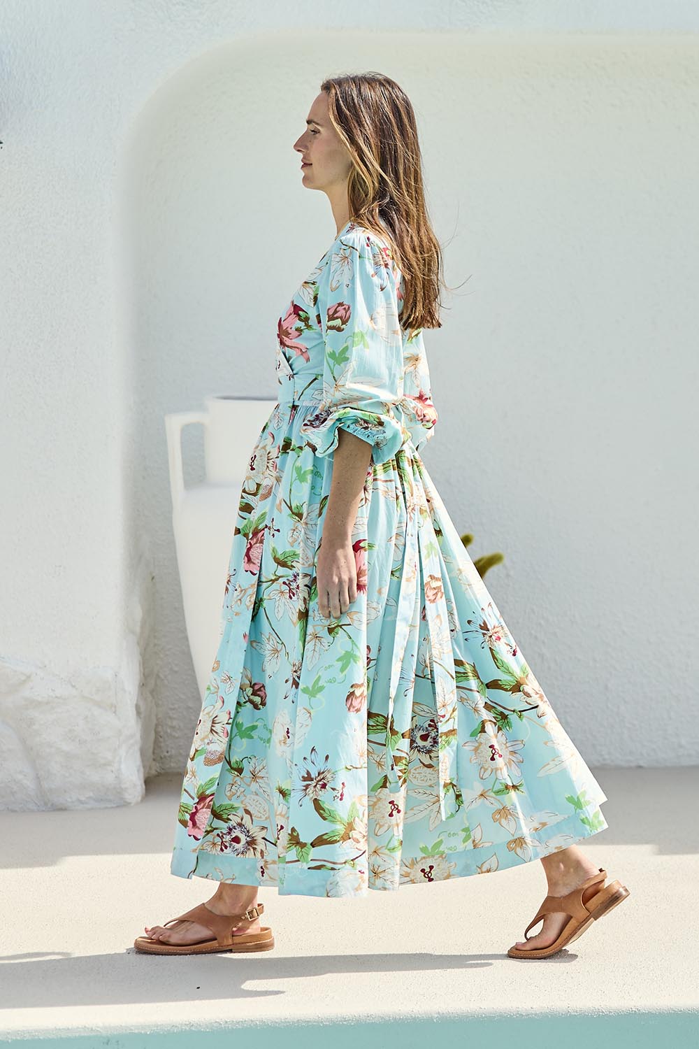 Model Tegand wearing size 10 of the Walking On Sunshine Cotton Maxi Wrap Dress – Skybloom in colour Skybloom, from the front