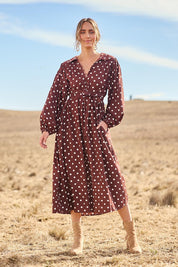 Model Tegan wearing size 10 of the I Can Always Spot You Midi Dress in colour Chocspot, from the front, showing the whole outfit