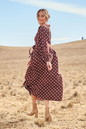 Model Tegan wearing size 10 of the I Can Always Spot You Midi Dress in colour Chocspot, from the front, showing the whole outfit