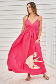 Model Tegand wearing size 10 of the Be My Bird Cotton Poplin Maxi Dress – Rose in colour Rose, from the front