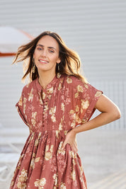 Model Tegand wearing size 10 of the In The Moment Cotton Maxi Dress – Rustrose in colour Rustrose, in a cropped view