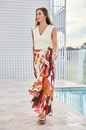 Model Tegand wearing size 10 of the Wrap Me With Love Cotton Maxi Skirt – Garden in colour Garden, from the front