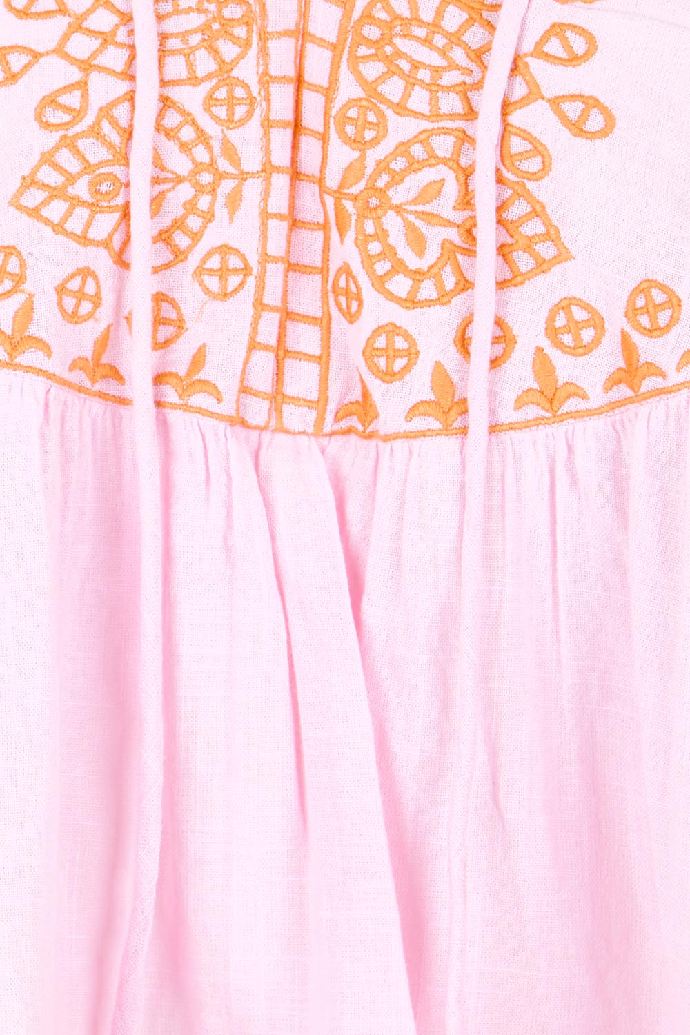 Product shot of the Loving You Is Easy Embroidered Cotton Blouse  - Pinktangerine in colour Pinktangerine, showing detail