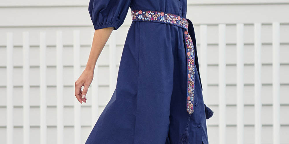 Model Tegand wearing size 10 of the Lunch With The Girls Cotton Poplin Dress – Deepblue in colour Deepblue, from the front