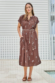 Model Tegand wearing size 10 of the Wildflower Embroidered Cotton Tunic Dress – Chocolate in colour Chocolate, from the front