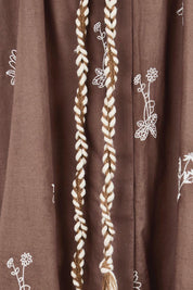 Product shot of the Wildflower Embroidered Cotton Tunic Dress – Chocolate in colour Chocolate, showing detail