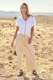 Model Tegan wearing size 10 of the You Make Me Happy Barrel Leg Jeans in colour Natural, from the front, showing the whole outfit