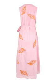 Product shot of the Sweet Pea Embroidered Cotton Wrap Dress - Pinktangerine in colour Pinktangerine, from the back
