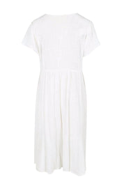 Product shot of the Cute As A Button Cotton Midi Dress – White in colour White, from the back