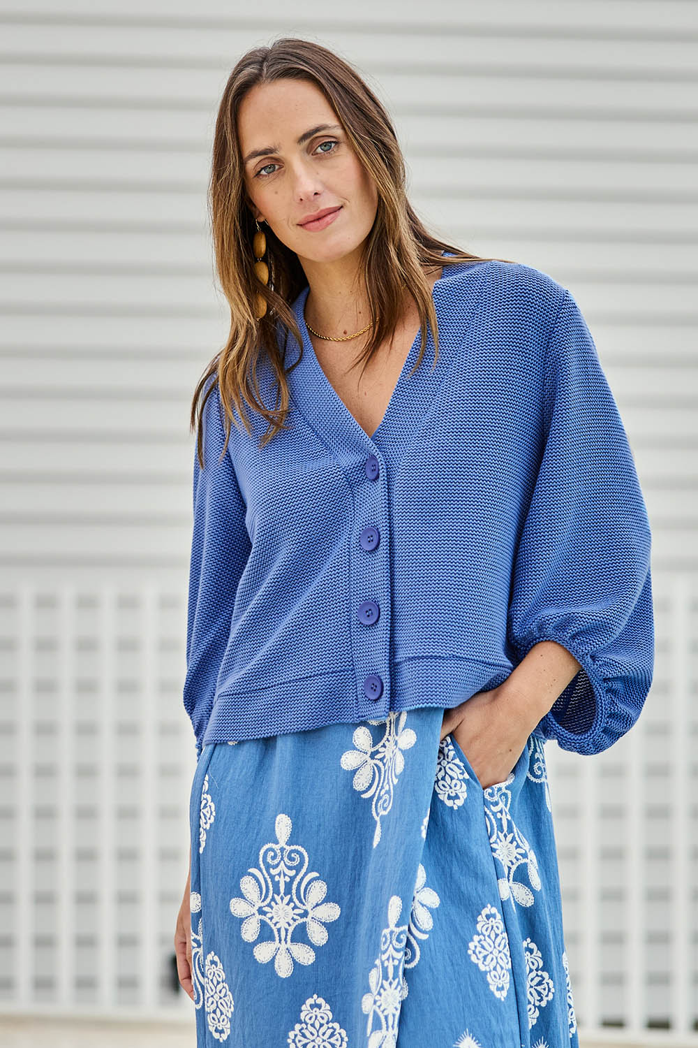Model Tegand wearing size 10 of the Easy Day Balloon Sleeve Cropped Cardi – Skyblue in colour Skyblue, in a cropped view