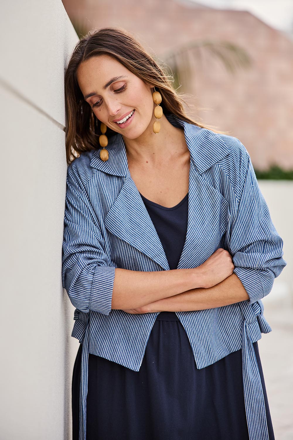 Model Tegand wearing size 10 of the Errand Run Cropped Cotton Trench – Bluestripe in colour Bluestripe, in a cropped view