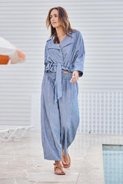 Model Tegand wearing size 10 of the Errand Run Cropped Cotton Trench – Bluestripe in colour Bluestripe, from the front