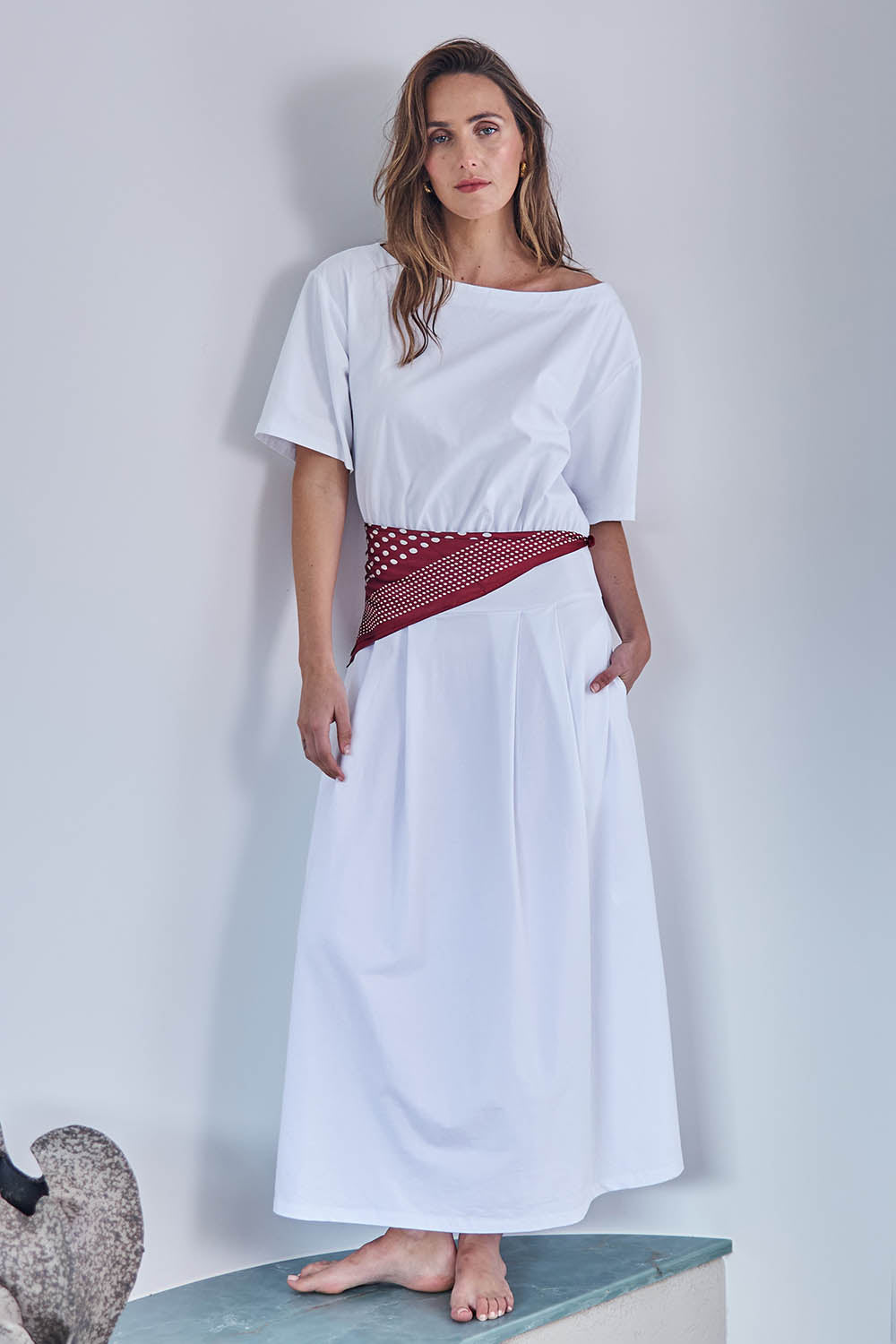 Model Tegand wearing size 10 of the Good Feels Maxi Tee Dress - White in colour White, from the front