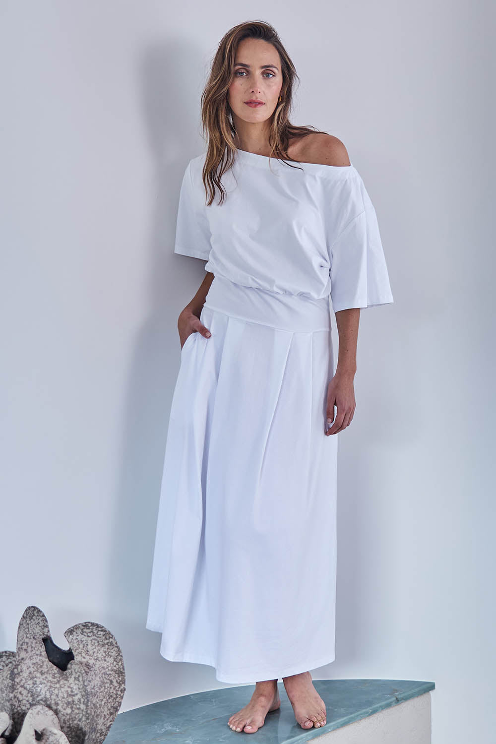 Model Tegand wearing size 10 of the Good Feels Maxi Tee Dress - White in colour White, from the front