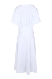 Product shot of the Good Feels Maxi Tee Dress - White in colour White, from the back