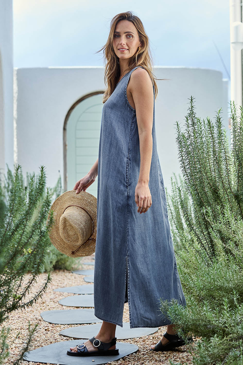 Model Tegand wearing size 10 of the Perfect Day Lyocell Shift Maxi Dress – Denim in colour Denim, from the front